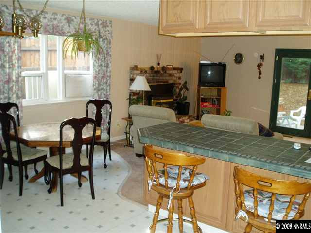 2705 Judith Lane Reno, NV 89503 - Photo 5 of 8 a view of a dining room with furniture and a window