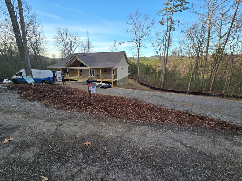 30 Small Street Blairsville, GA 30512 - Photo 13 of 36 a view of a house with backyard and trees
