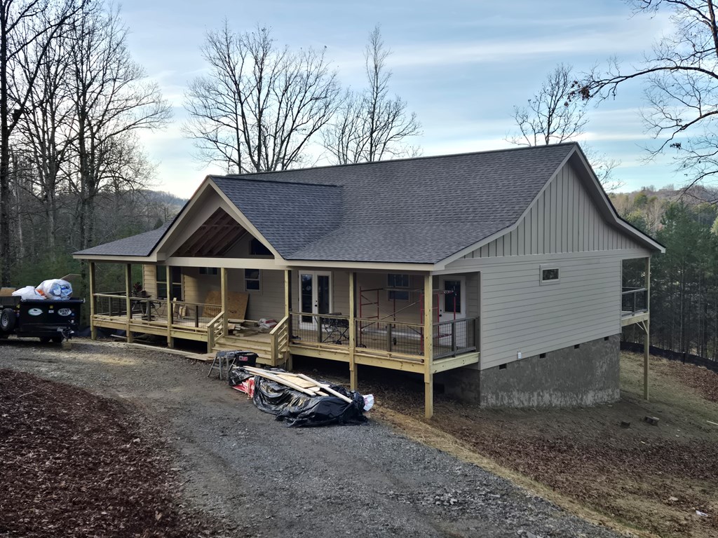 30 Small Street Blairsville, GA 30512 - Photo 2 of 36 a view of a house with a yard and porch