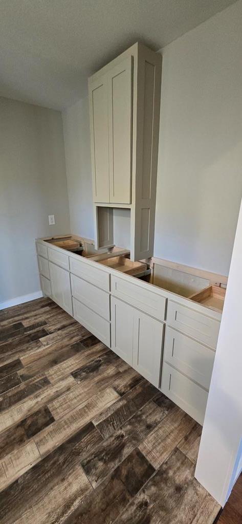 30 Small Street Blairsville, GA 30512 - Photo 22 of 36 a kitchen with a sink and cabinets