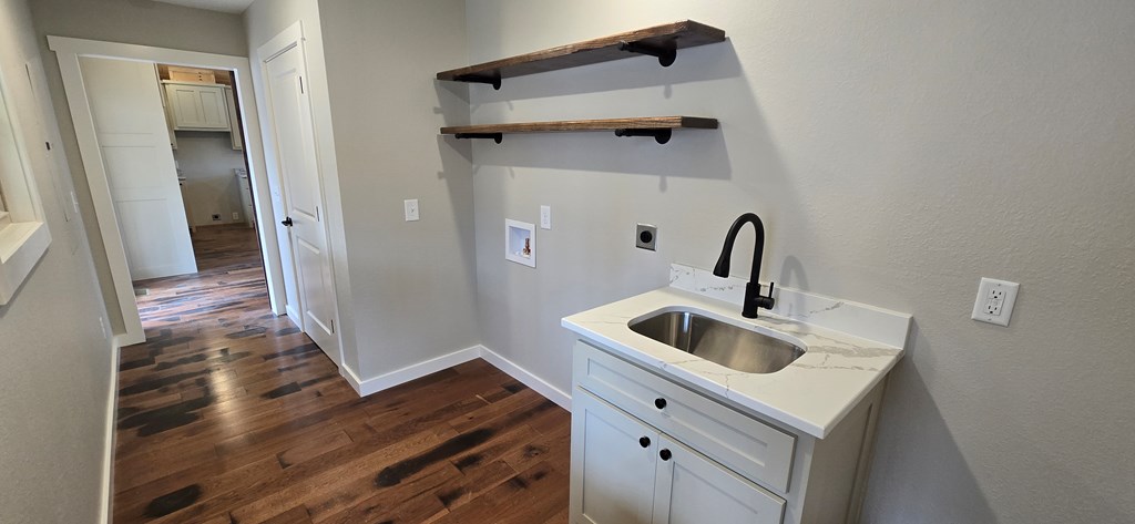 30 Small Street Blairsville, GA 30512 - Photo 25 of 36 a bathroom with a sink and mirror