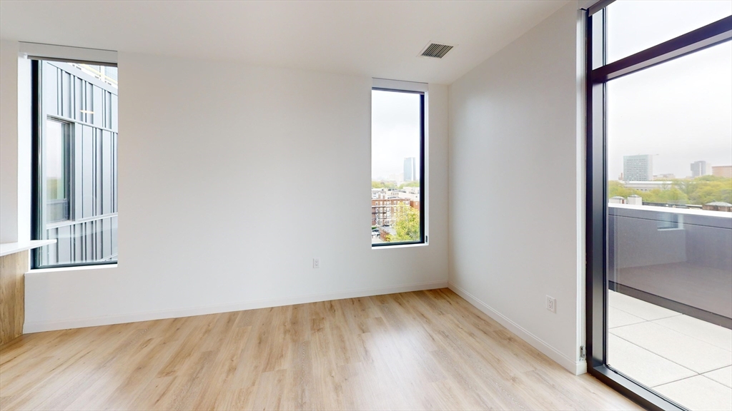 60 Kilmarnock Street, Unit 842 Boston, MA 02215 - Photo 6 of 13 a view of an empty room and window