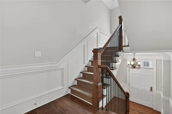 a view of entryway with wooden floor