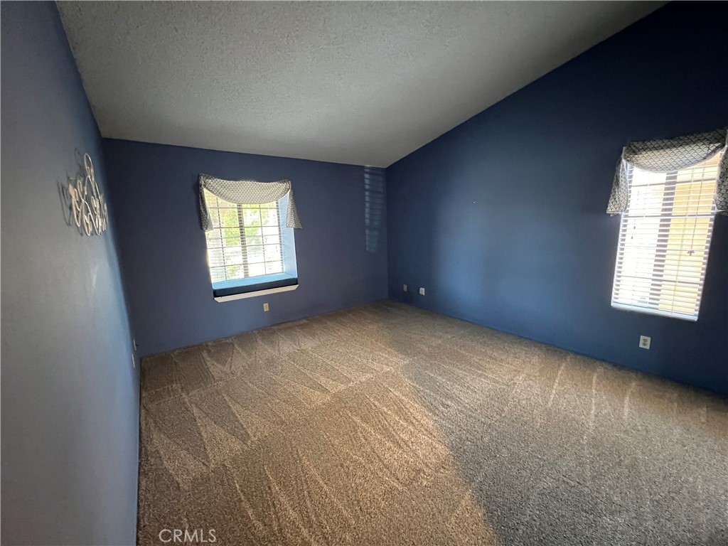 1419 Hancock Circle San Jacinto, CA 92583 - Photo 14 of 23 an empty room with a window