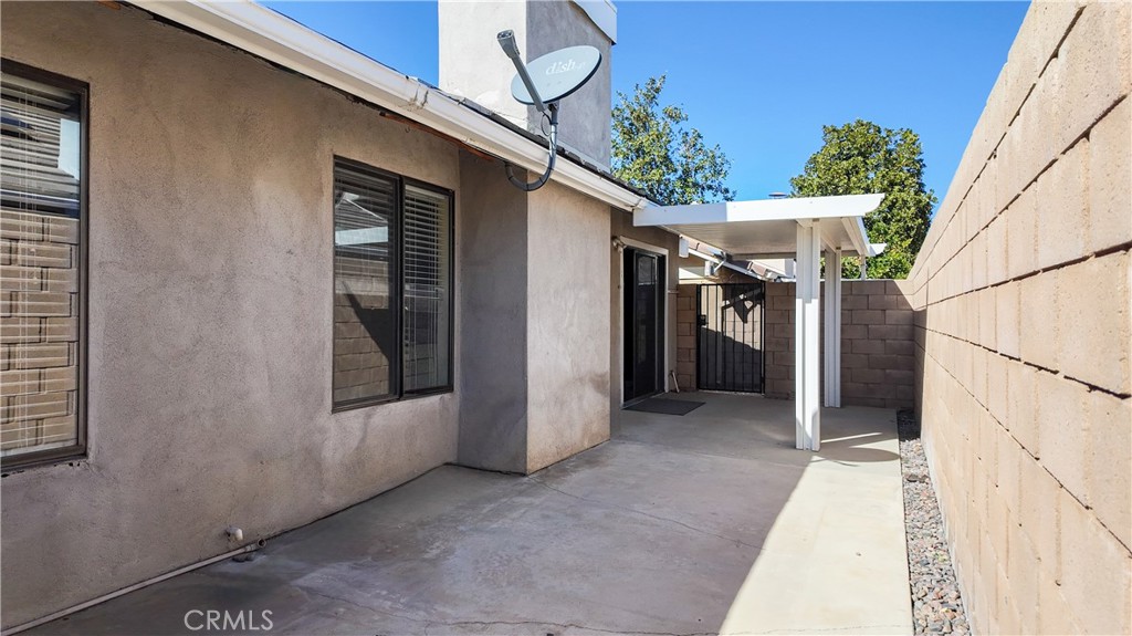 1419 Hancock Circle San Jacinto, CA 92583 - Photo 22 of 23 a view of a house with a backyard
