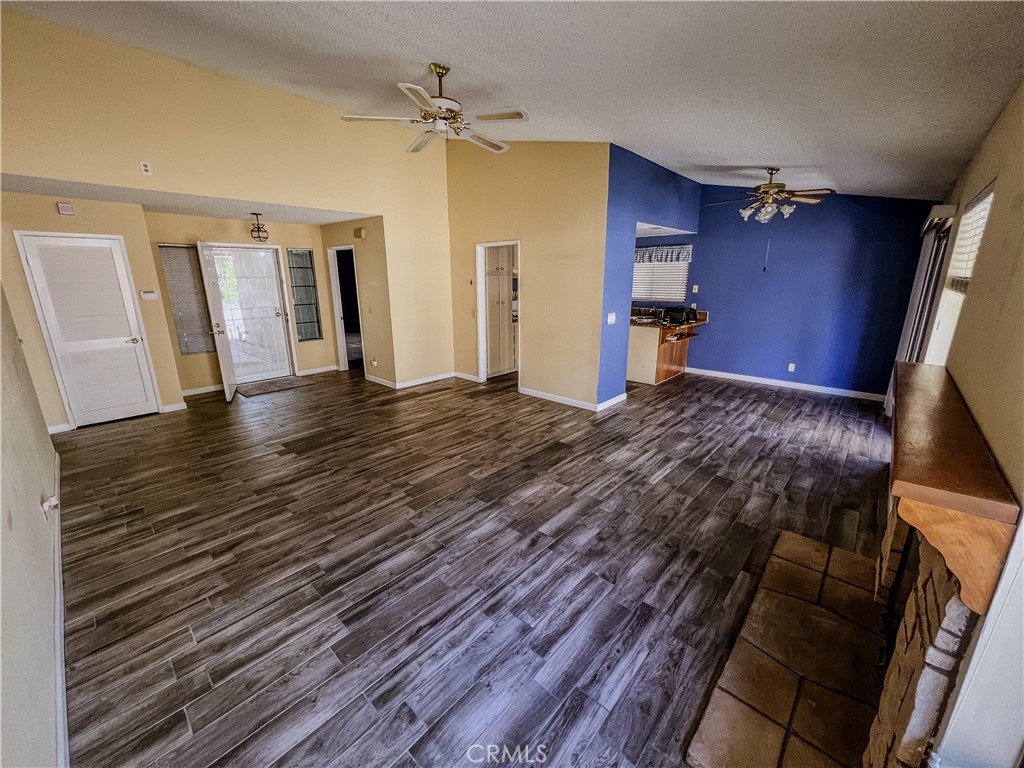1419 Hancock Circle San Jacinto, CA 92583 - Photo 4 of 23 a view of empty room with wooden floor