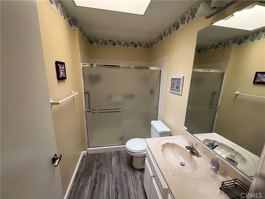 1419 Hancock Circle San Jacinto, CA 92583 - Photo 9 of 23 a bathroom with a sink and toilet