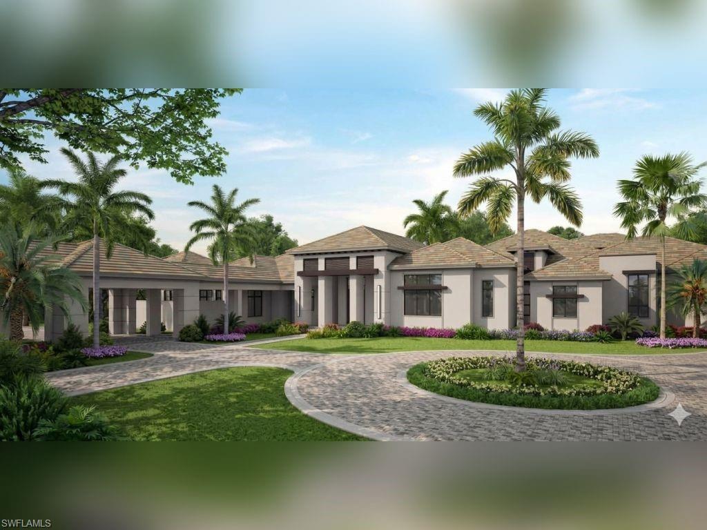 a front view of a house with a garden and plants