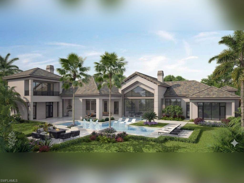 465 Gordonia Road Naples, FL 34108 - Photo 11 of 12 a front view of a house with garden and lake view