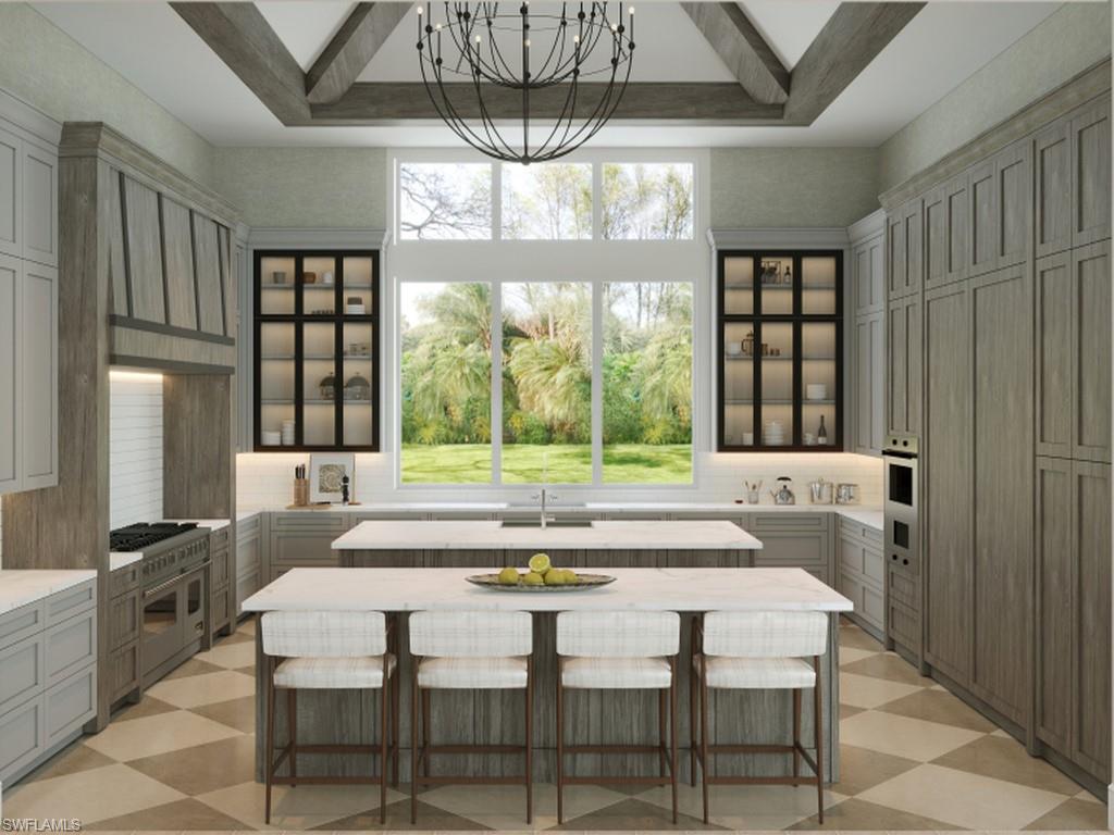 465 Gordonia Road Naples, FL 34108 - Photo 4 of 12 a dining room with a window and a chandelier