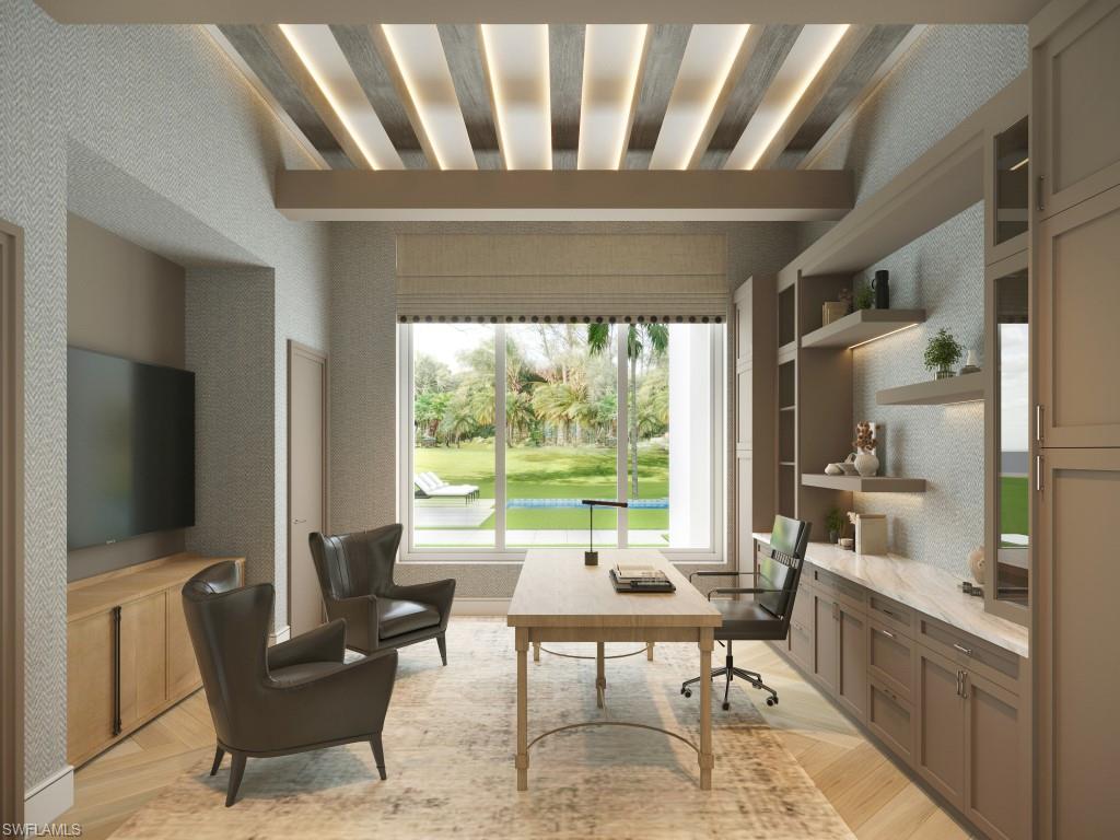 465 Gordonia Road Naples, FL 34108 - Photo 9 of 12 a living room with furniture and a flat screen tv