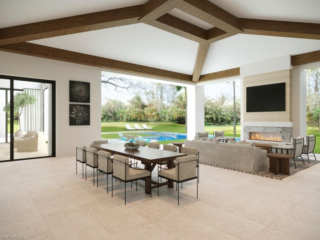 465 Gordonia Road Naples, FL 34108 - Photo 10 of 12 a view of a dining room with furniture window and outside view