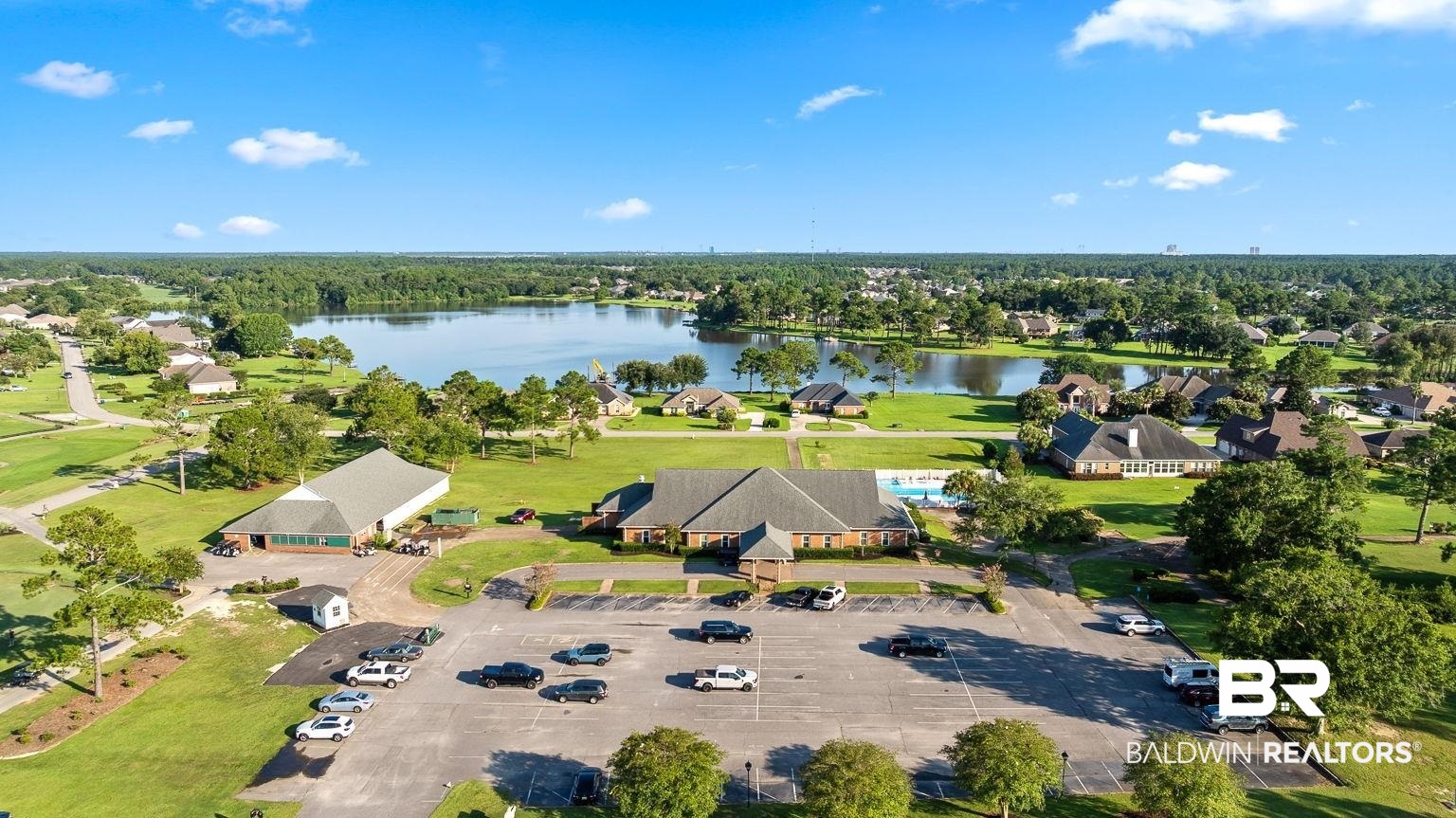 23357 Carnoustie Drive Foley, AL 36535 - Photo 94 of 99 Aerial overview of property's location with a large body of water and nearby suburban area