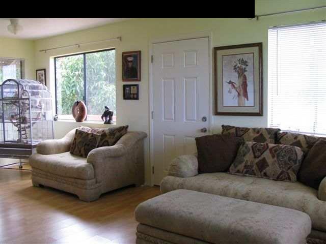 500 Kawelo Road Haiku, HI 96708 - Photo 6 of 13 a living room with furniture and a large window