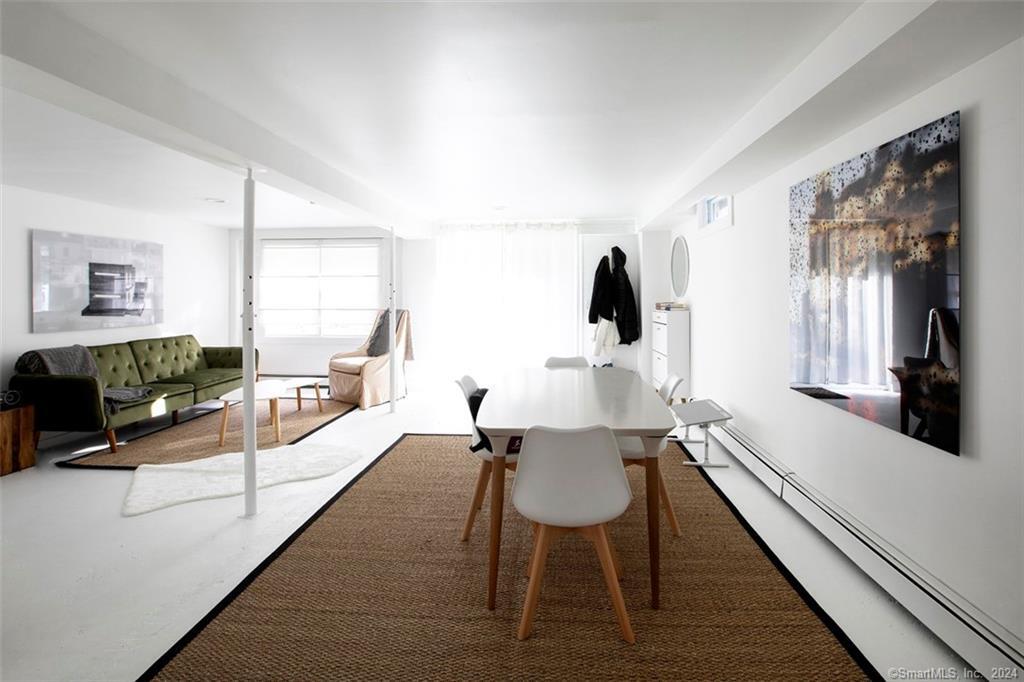 10 (lower) Sentry Hill Road Roxbury, CT 06783 - Photo 5 of 8 a living room with furniture and a flat screen tv