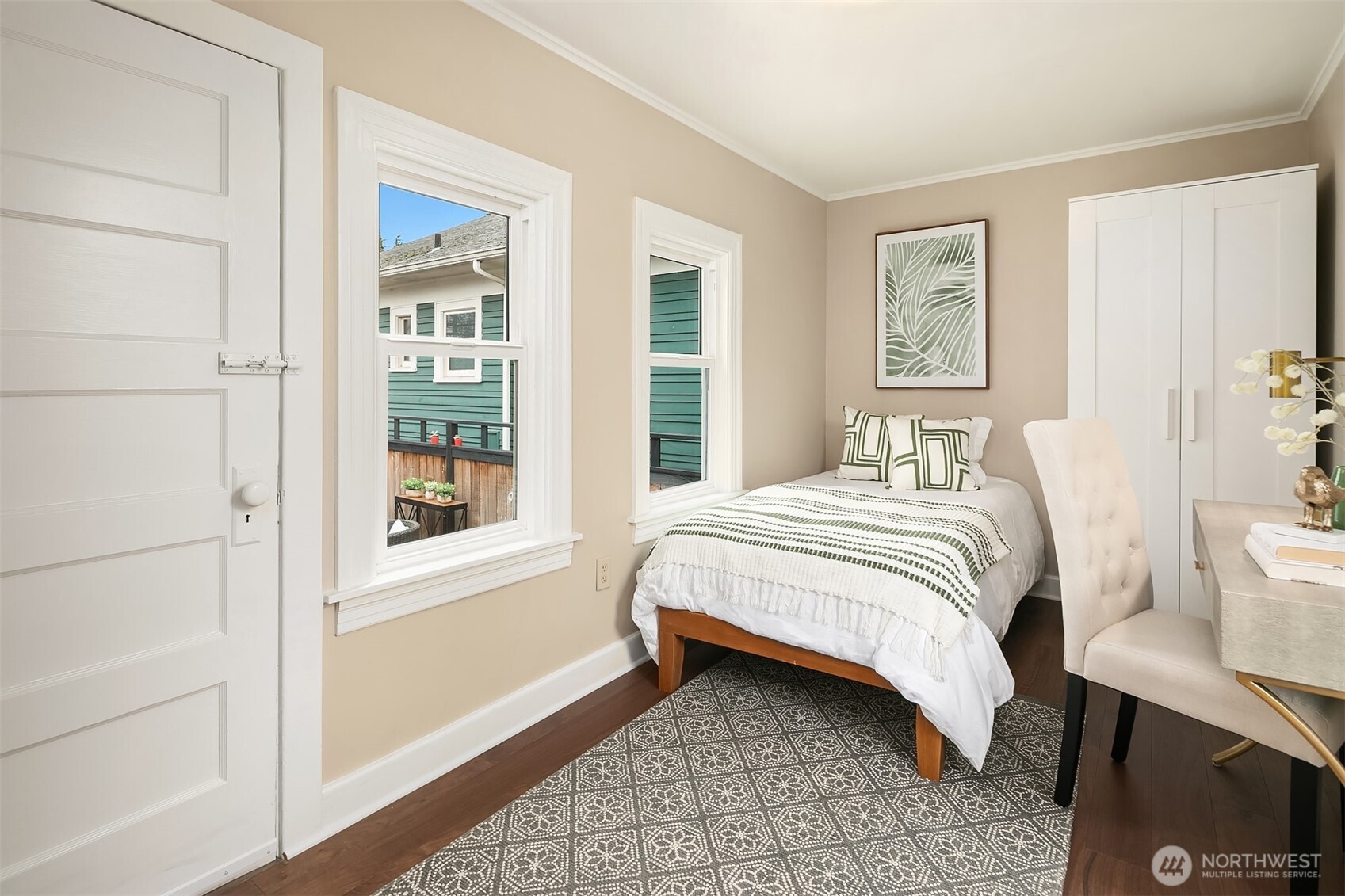 511 West McGraw Street Seattle, WA 98119 - Photo 14 of 21 a bedroom with a bed and a window