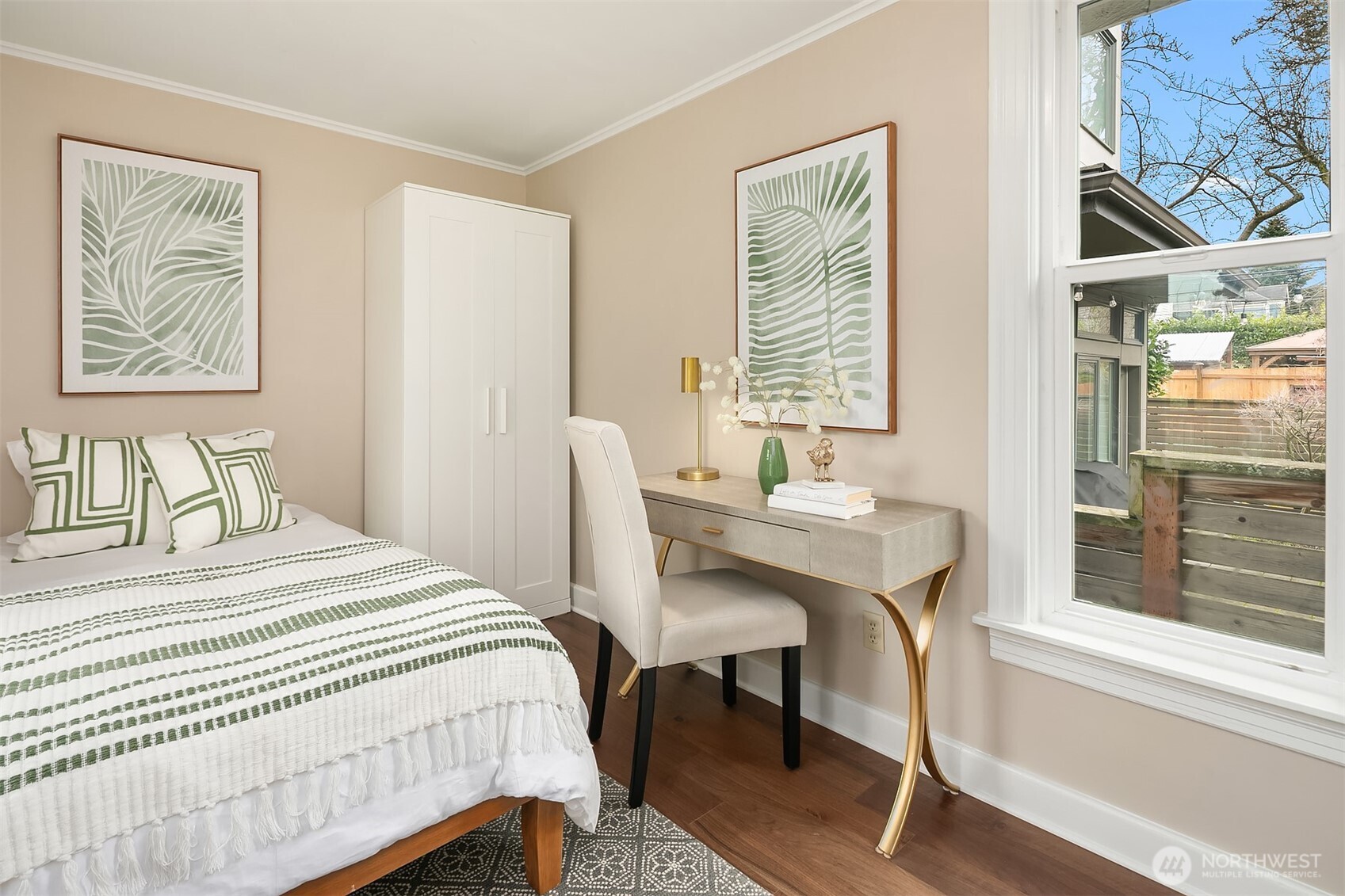 511 West McGraw Street Seattle, WA 98119 - Photo 15 of 21 a bedroom with a bed and a table