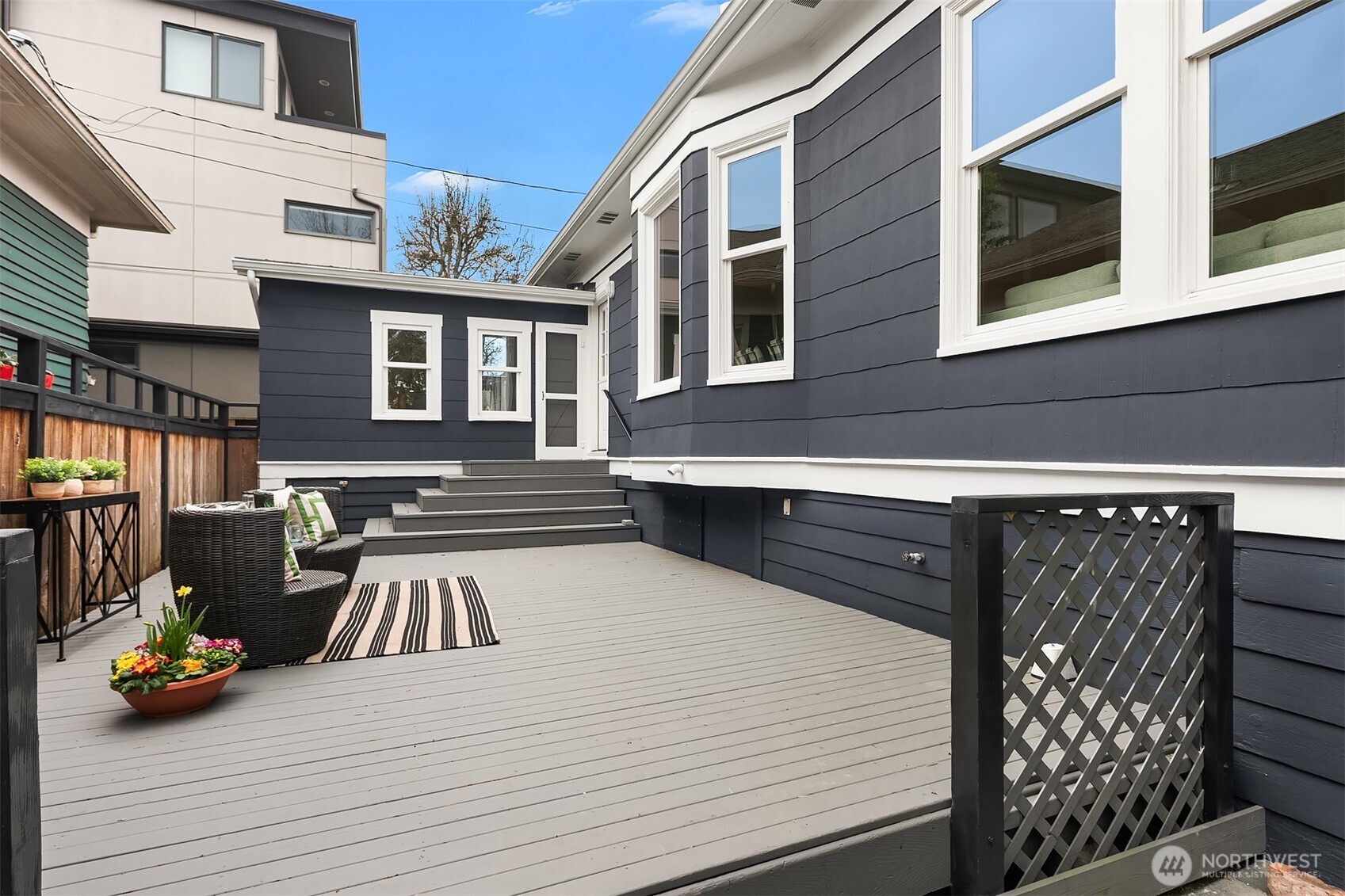 511 West McGraw Street Seattle, WA 98119 - Photo 19 of 21 a view of a patio with couches chairs and wooden floor