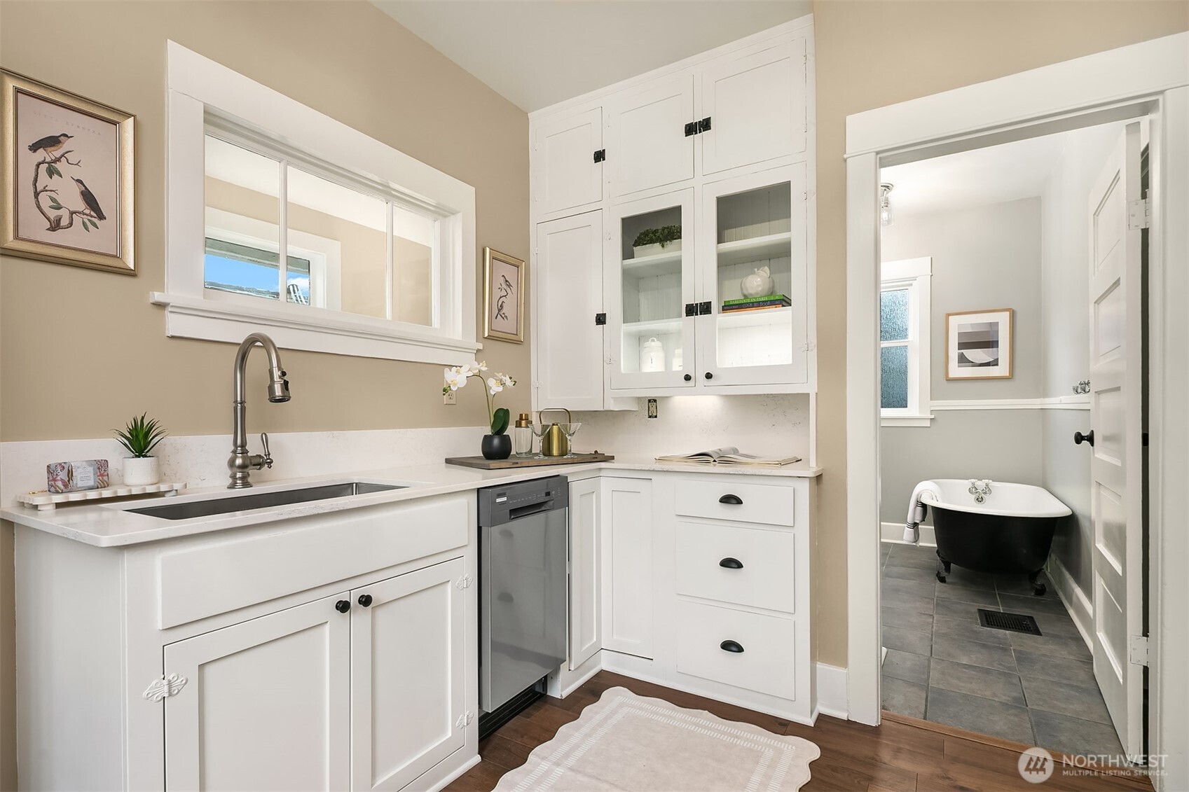 511 West McGraw Street Seattle, WA 98119 - Photo 9 of 21 a bathroom with a sink vanity and mirror