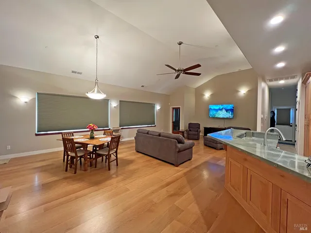 a room with cabinets and wooden floor