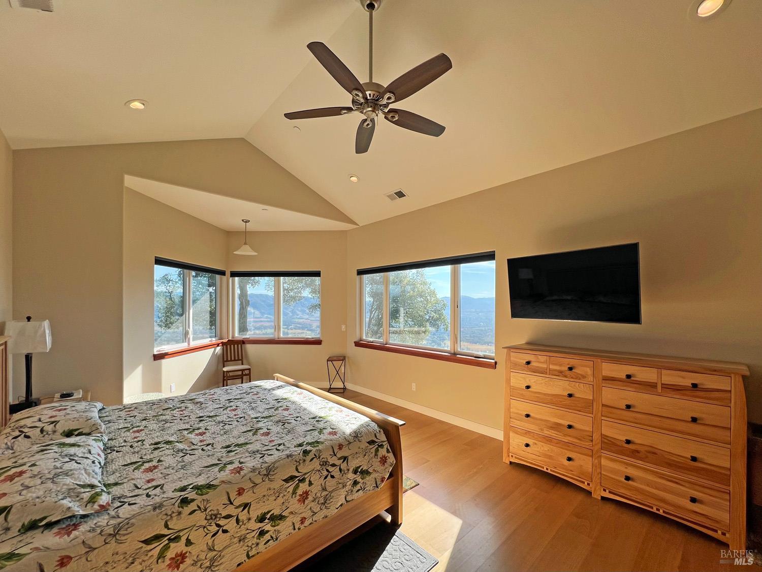 11401 Bakers Creek Road Redwood Valley, CA 95470 - Photo 24 of 70 a bedroom with a bed and a flat screen tv