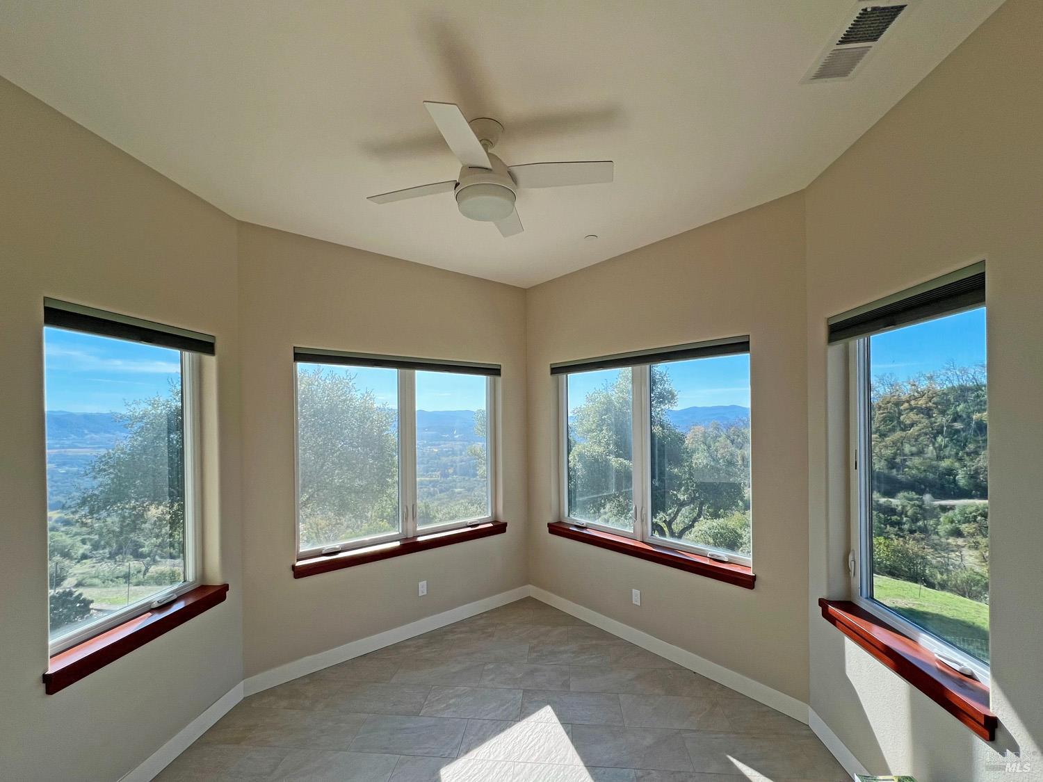 11401 Bakers Creek Road Redwood Valley, CA 95470 - Photo 29 of 70 a view of an empty room with a window