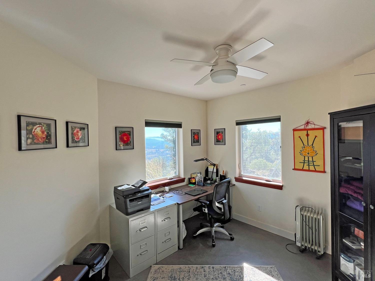 11401 Bakers Creek Road Redwood Valley, CA 95470 - Photo 36 of 70 a view of a workspace with furniture and a window