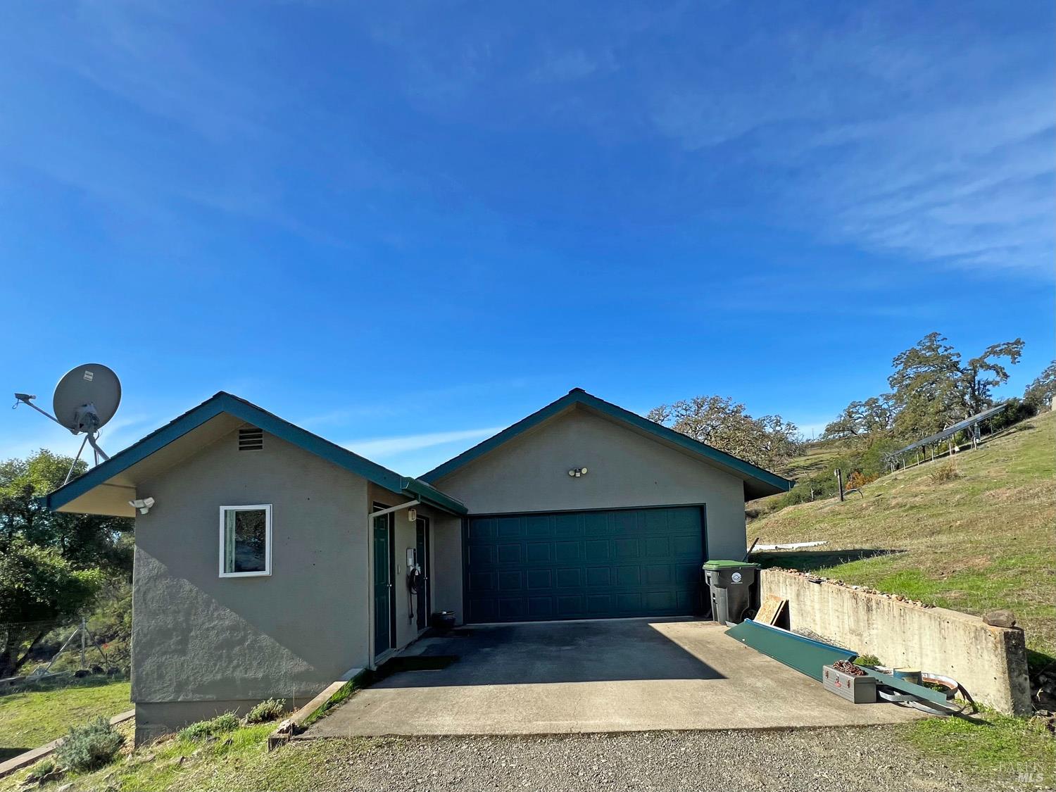 11401 Bakers Creek Road Redwood Valley, CA 95470 - Photo 40 of 70 a front view of a house with a yard
