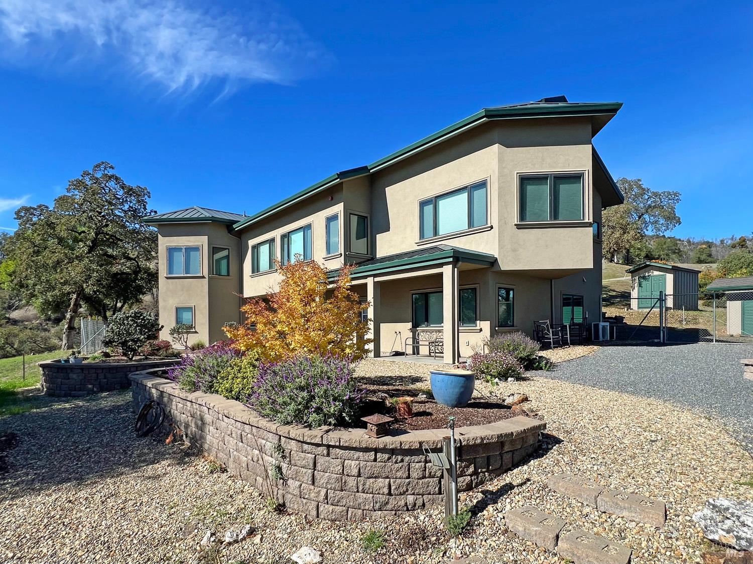 11401 Bakers Creek Road Redwood Valley, CA 95470 - Photo 7 of 70 a front view of a house with entertaining space