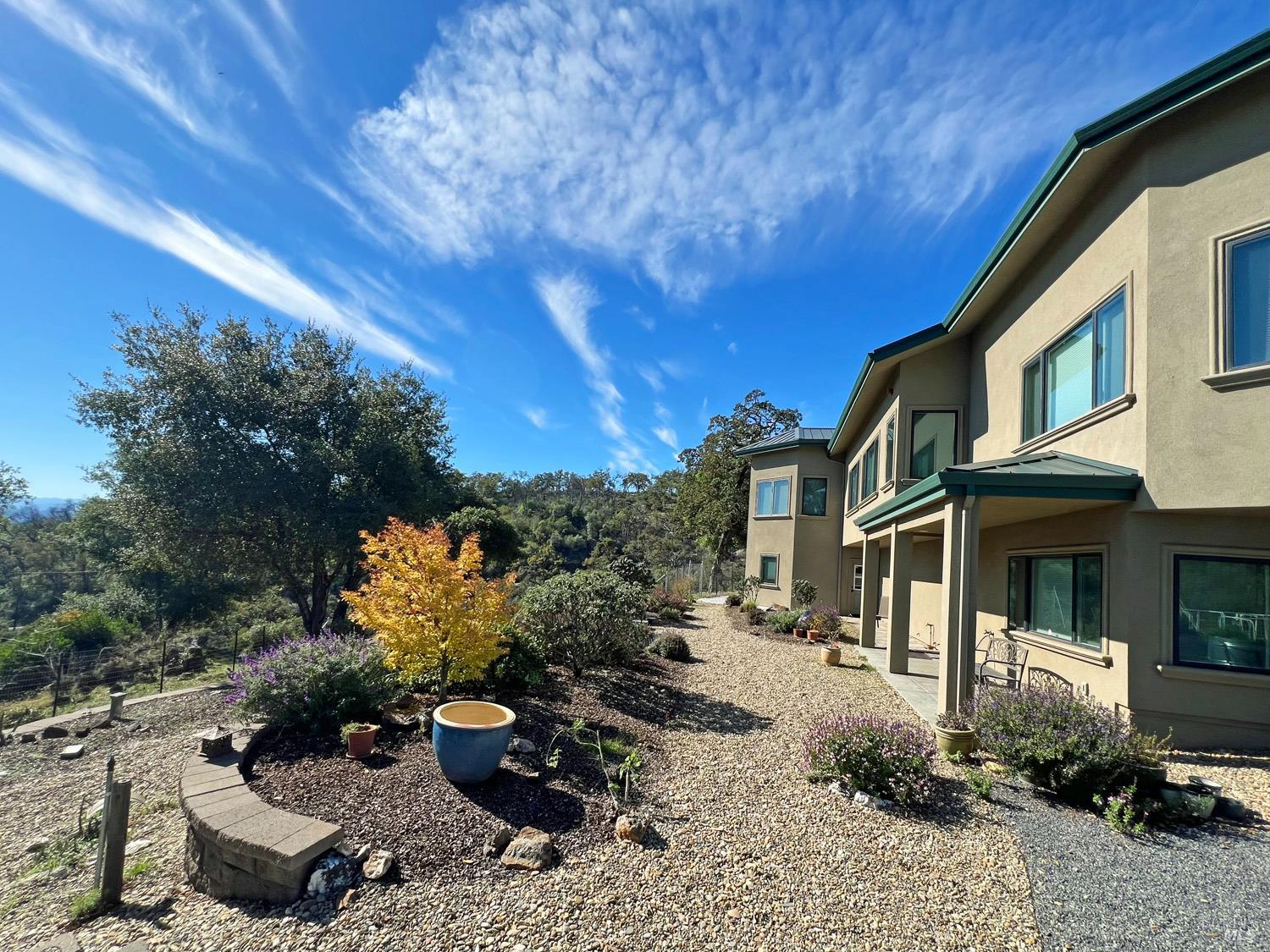 11401 Bakers Creek Road Redwood Valley, CA 95470 - Photo 10 of 70 a view of a backyard with sitting area