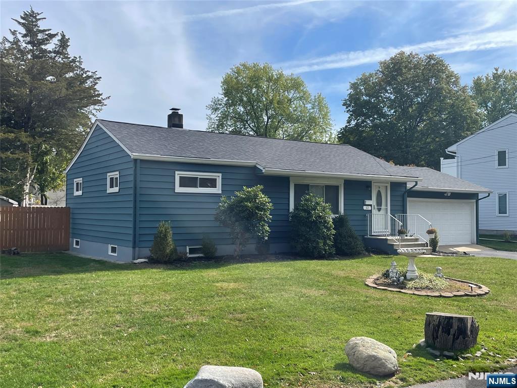 12 Fordham Road Oakland, NJ 07436 - Photo 2 of 26 a view of a house with a yard and sitting area