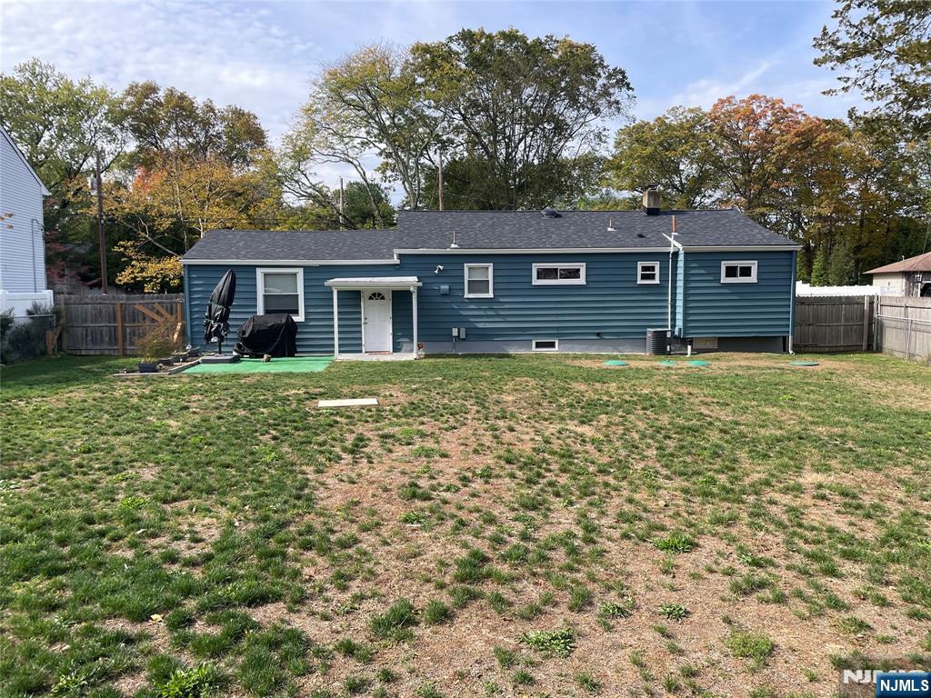 12 Fordham Road Oakland, NJ 07436 - Photo 26 of 26 a view of a yard in front of a house with large tree