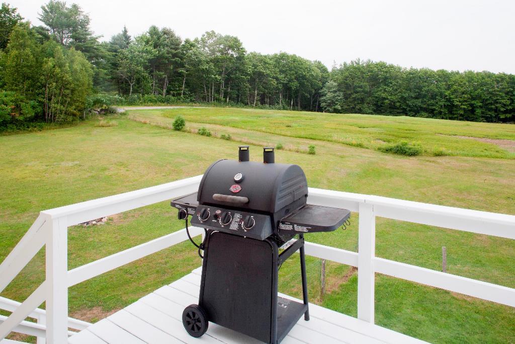 1223 Great Pond Road Aurora, ME 04408 - Photo 13 of 28 2nd floor back yard deck off kitchen