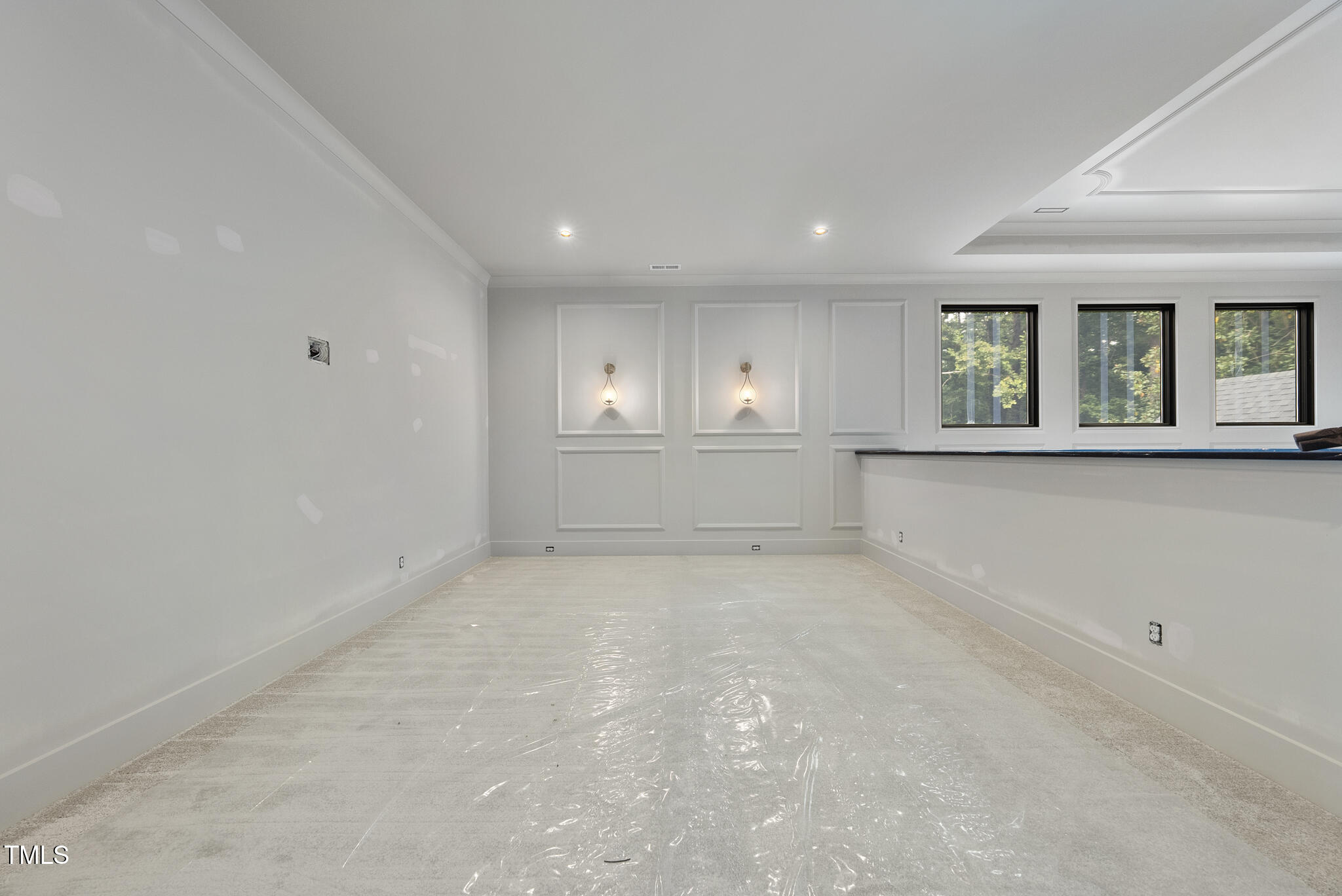 5013 Coronado Drive Raleigh, NC 27609 - Photo 29 of 76 an empty room with windows