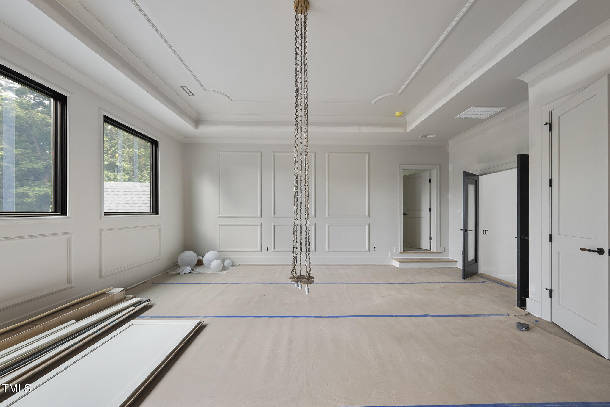 5013 Coronado Drive Raleigh, NC 27609 - Photo 32 of 76 a view of entryway with stairs