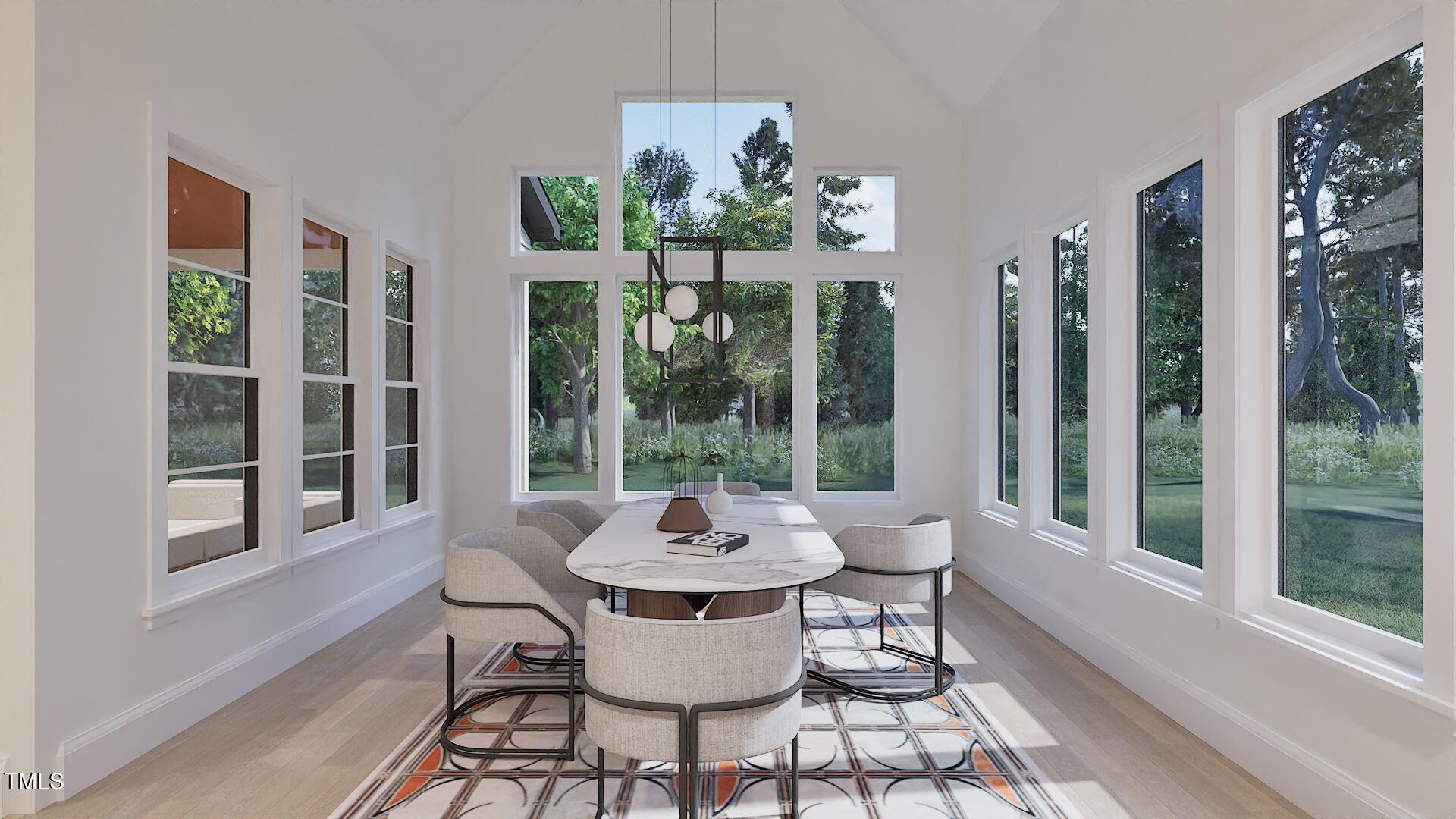 5013 Coronado Drive Raleigh, NC 27609 - Photo 54 of 76 a view of a dining room with furniture wooden floor and chandelier