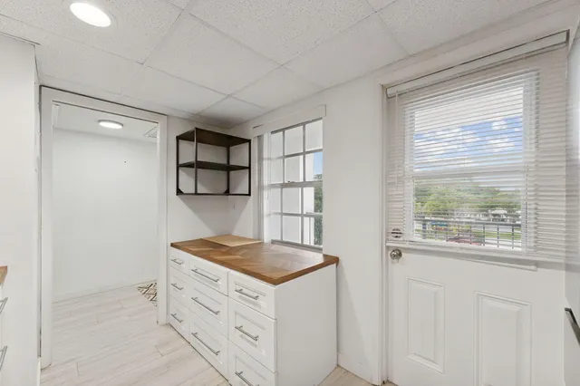 a kitchen with stainless steel appliances granite countertop a stove and a refrigerator