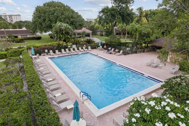a view of a swimming pool with a patio