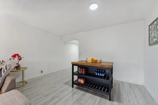 a view of workspace with wooden floor