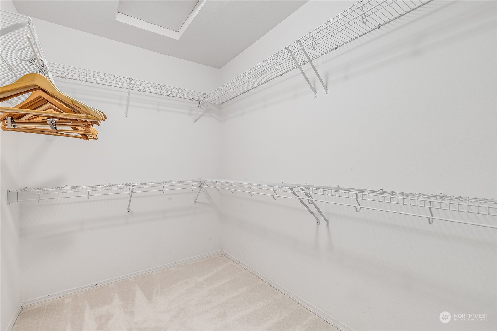 10030 Holly Drive, Unit 122 Everett, WA 98204 - Photo 23 of 29 a view of a room with racks on the wall