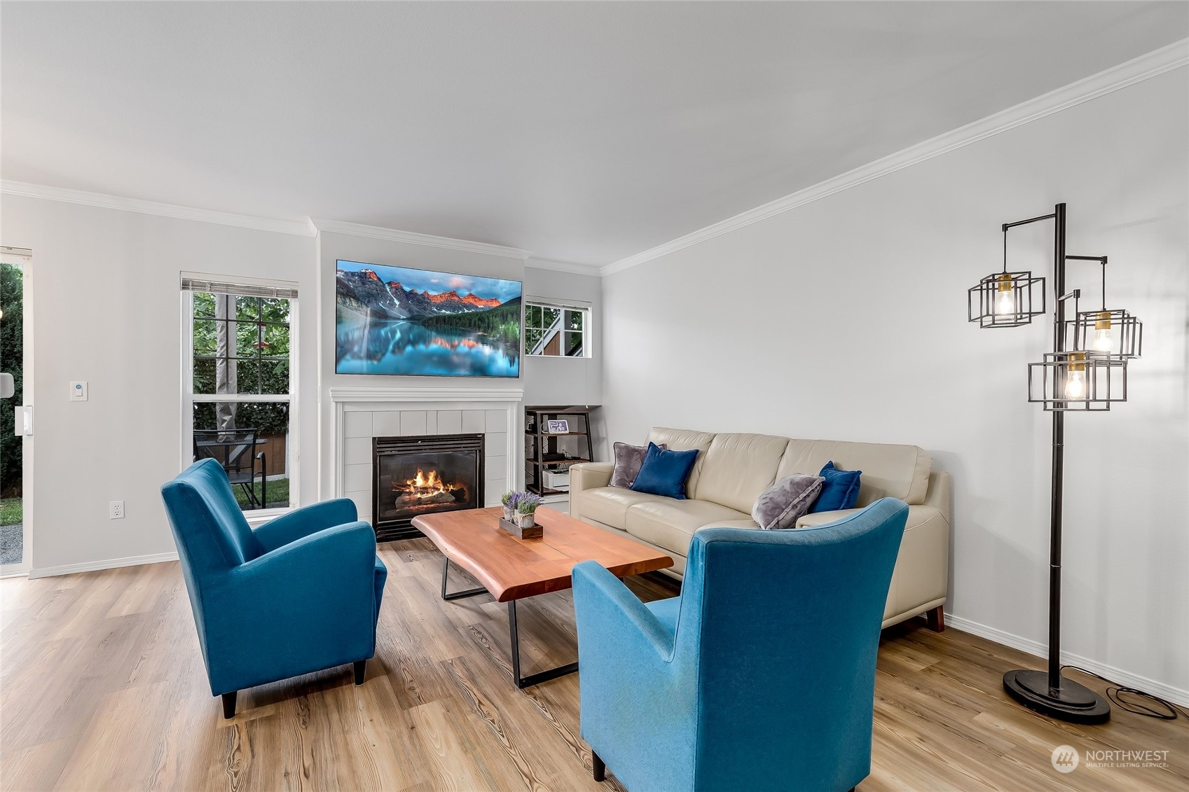 10030 Holly Drive, Unit 122 Everett, WA 98204 - Photo 3 of 29 a living room with furniture and a fireplace
