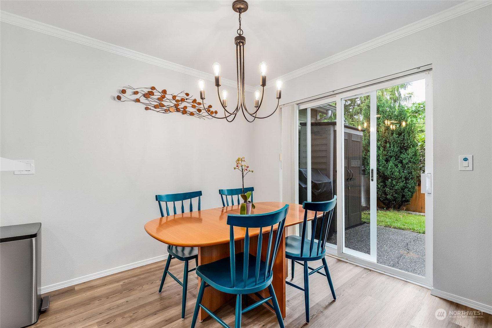 10030 Holly Drive, Unit 122 Everett, WA 98204 - Photo 6 of 29 a view of a dining room with furniture window and wooden floor
