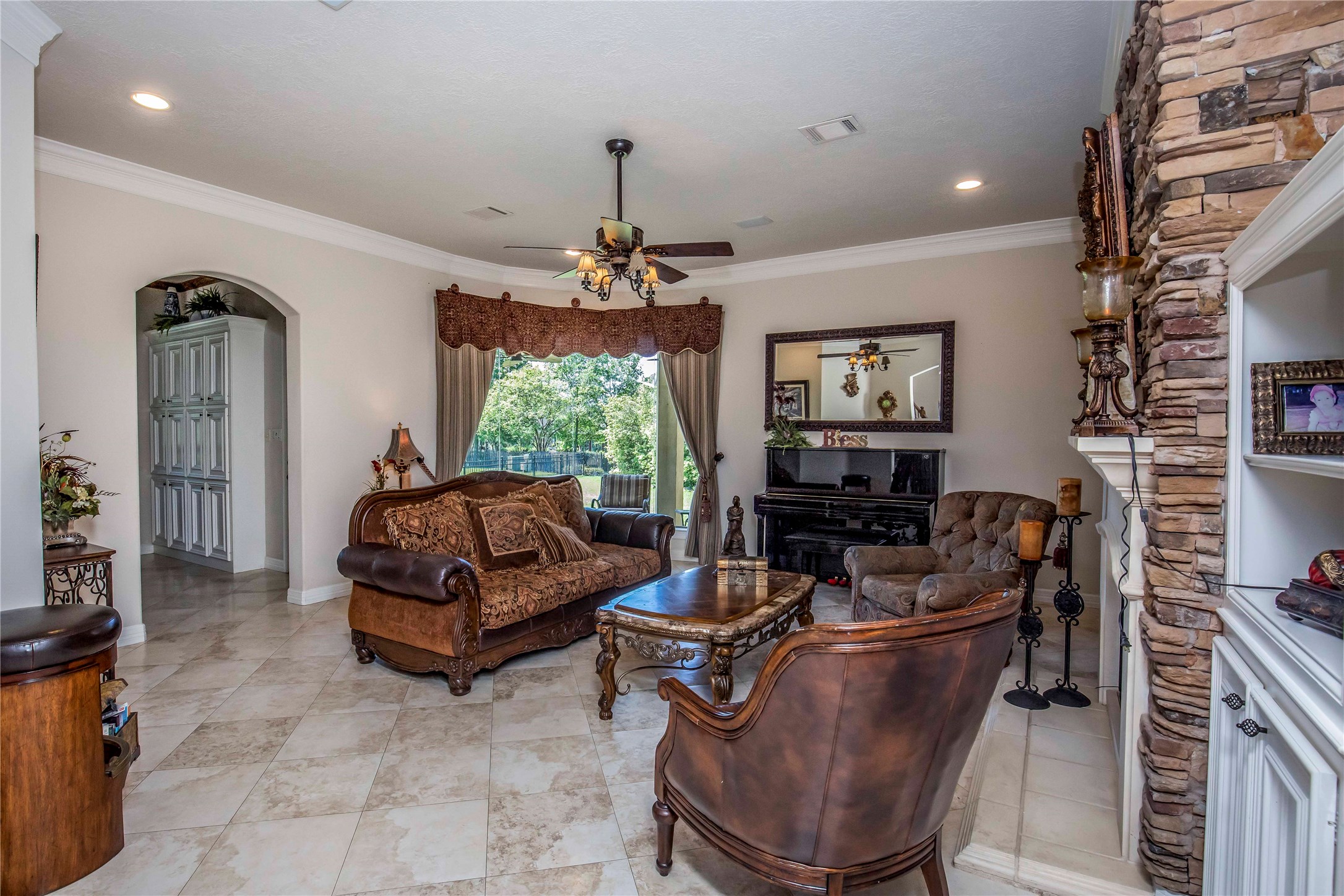 25219 Hideaway Run Drive Spring, TX 77389 - Photo 15 of 45 a living room with furniture and a chandelier