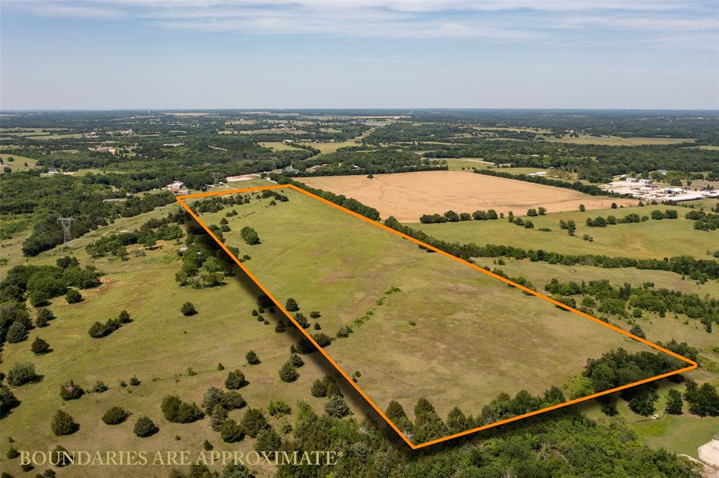 31.062 Ballard Road Van Alstyne, TX 75495 - Photo 4 of 11 Drone / aerial view with a rural view