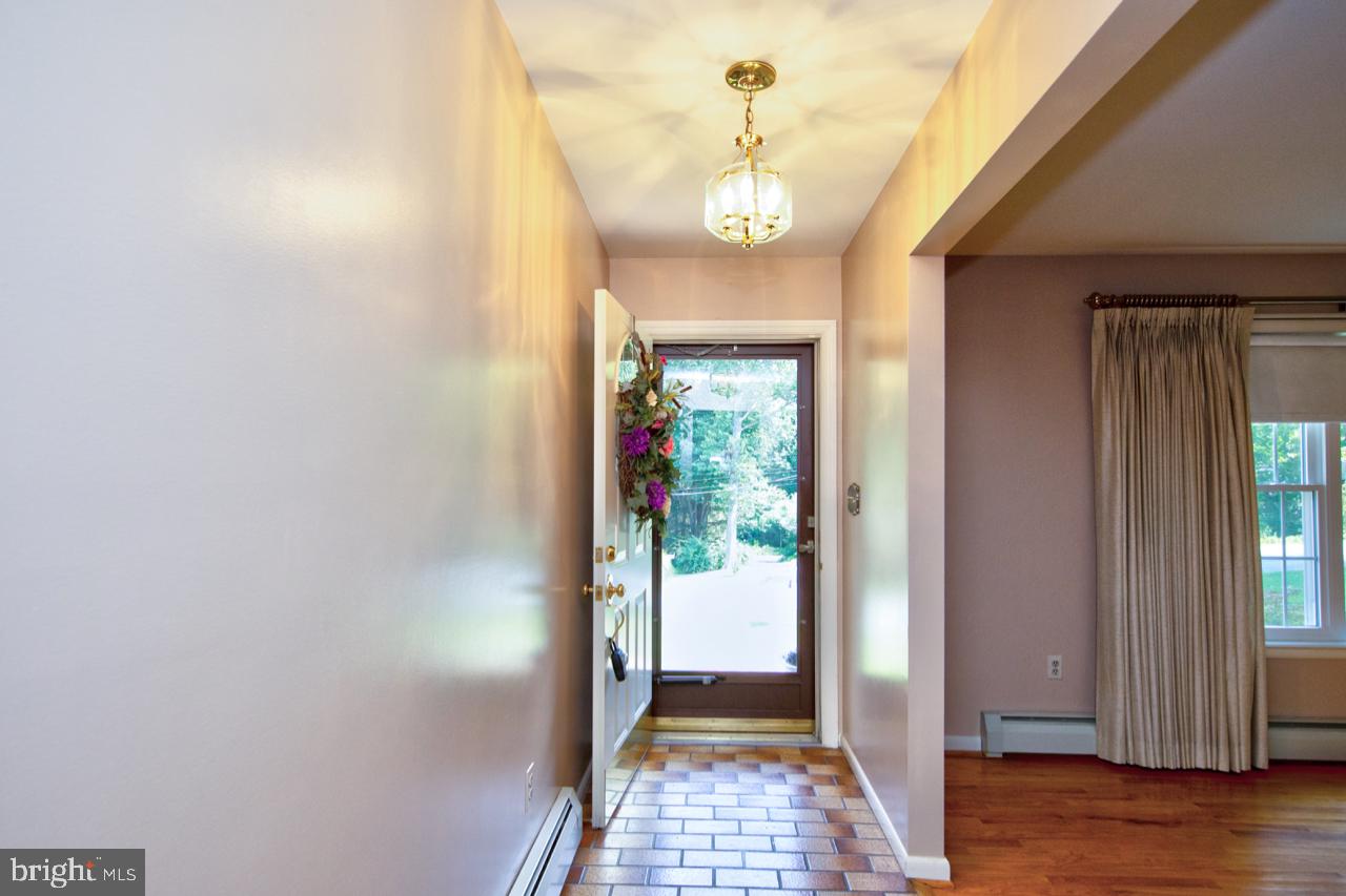 8701 Inwood Road Baltimore, MD 21244 - Photo 3 of 34 Welcome Home/ well lit foyer w/ custom flooring