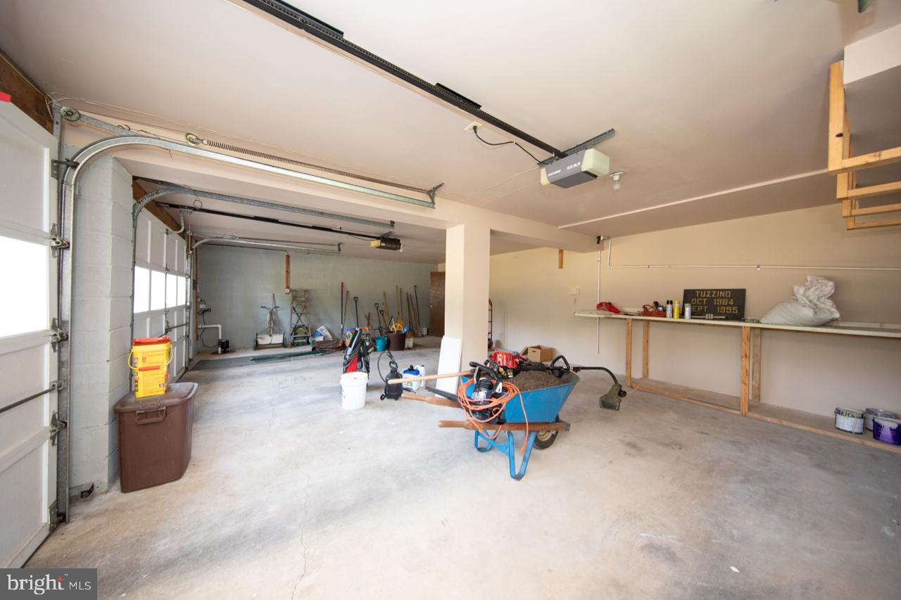 8701 Inwood Road Baltimore, MD 21244 - Photo 29 of 34 Oversized two car garage w/ workbench & storage