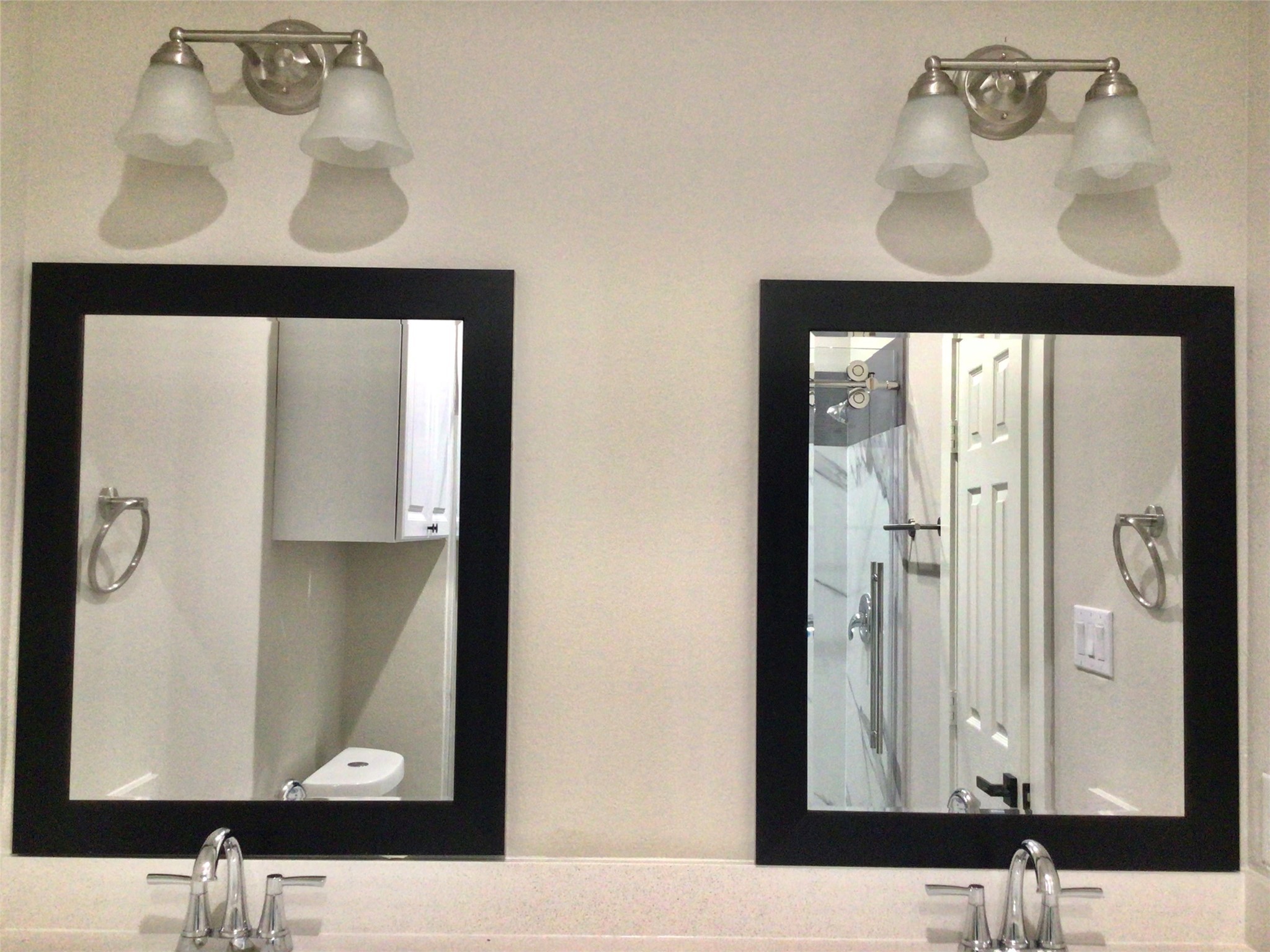 2109 Marnel Road, Unit C Houston, TX 77055 - Photo 13 of 27 a bathroom with a sink and a mirror