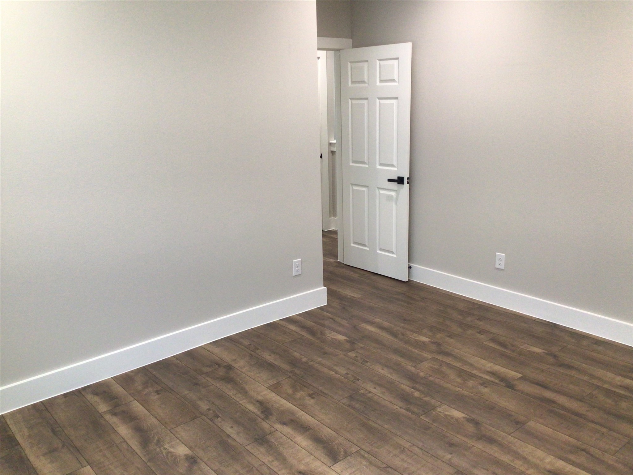 2109 Marnel Road, Unit C Houston, TX 77055 - Photo 10 of 27 an empty room with wooden floor and closet