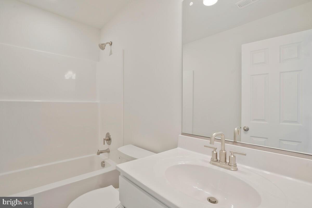 284 Topher's Trail Prince Frederick, MD 20678 - Photo 15 of 16 Sleek and modern bathroom oasis.