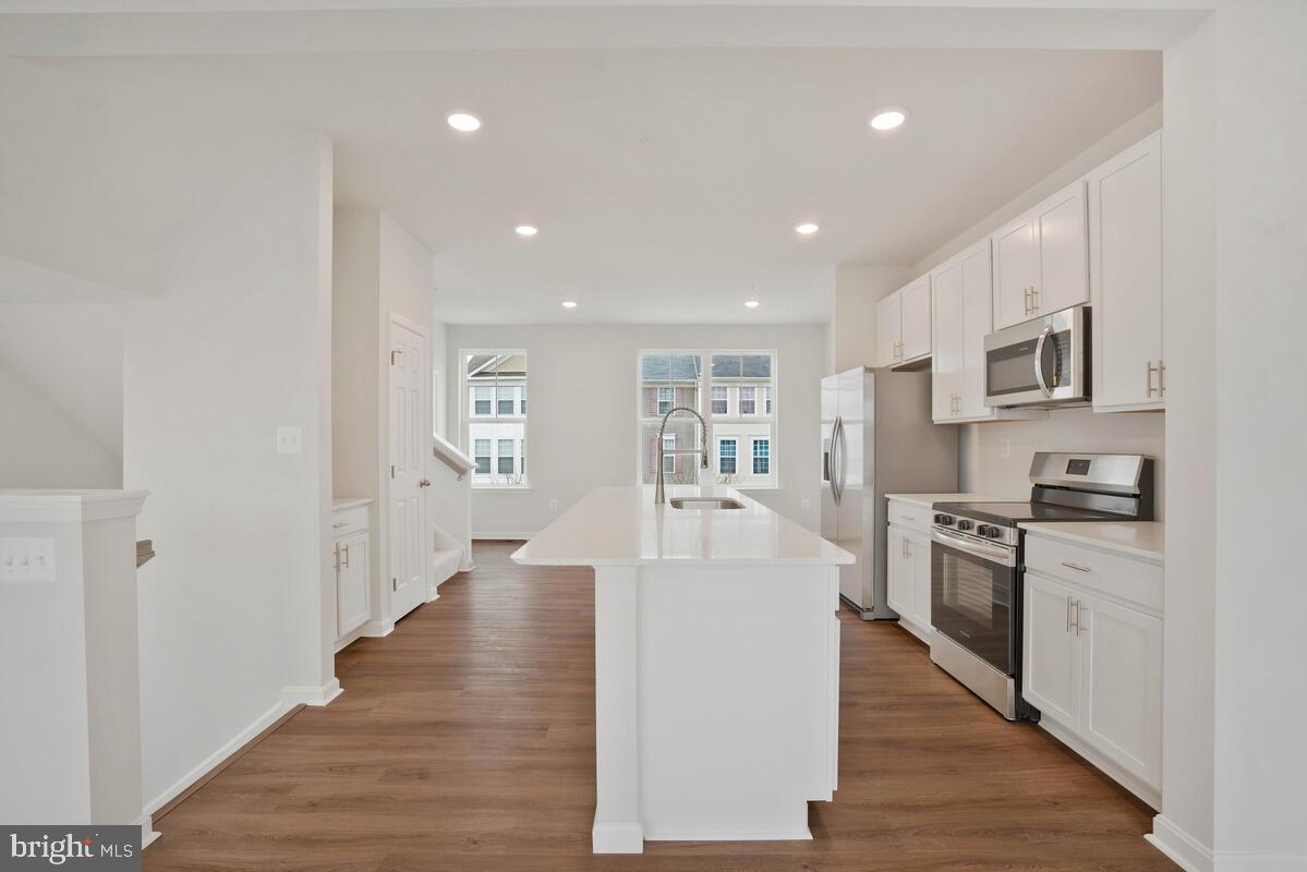 284 Topher's Trail Prince Frederick, MD 20678 - Photo 2 of 16 Modern kitchen with sleek finishes.